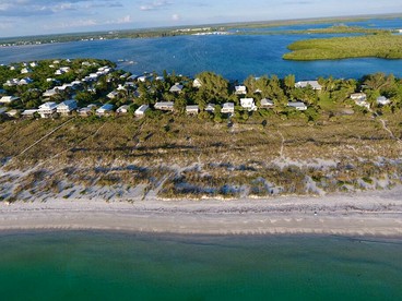 Charming Old Florida Cottage with Private Dock & Sunset Views near Little Gasparilla Island, FL - Placida, Florida - glamping.directory