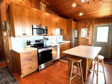 Charming Old Florida Cottage with Private Dock & Sunset Views near Little Gasparilla Island, FL - Placida, Florida - glamping.directory