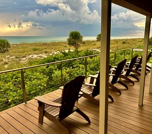 Charming Old Florida Cottage with Private Dock & Sunset Views near Little Gasparilla Island, FL - Placida, Florida - glamping.directory