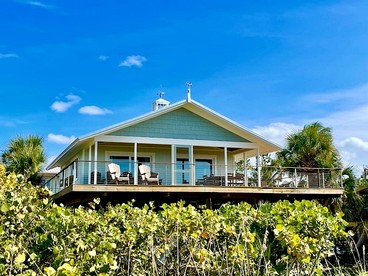 Charming Old Florida Cottage with Private Dock & Sunset Views near Little Gasparilla Island, FL - glamping.directory
