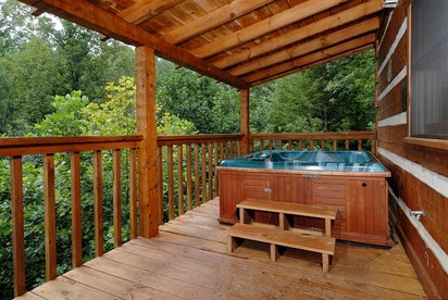 Rustic Getaway Cabin with Hot Tub, Pool Table, and PlayStation near Smokies in Gatlinburg, Tennessee - Gatlinburg, Tennessee - glamping.directory
