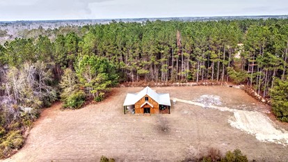 Luxury Vineyard Barn Retreat with Private Trails Near Nashville, Georgia - glamping.directory