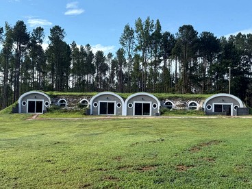 Unique Earth Home Stay with Pet Goats and Fishing Pond near Lake Gaston NC - glamping.directory