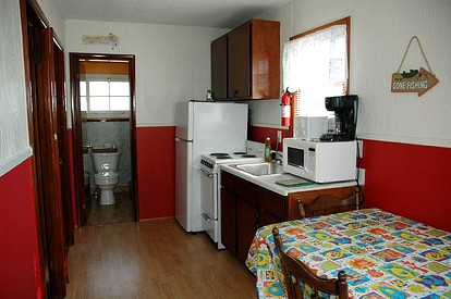 Lovely Lakefront Cottage Rental with Private Beach in New Hampshire - Weirs Beach, New Hampshire - glamping.directory