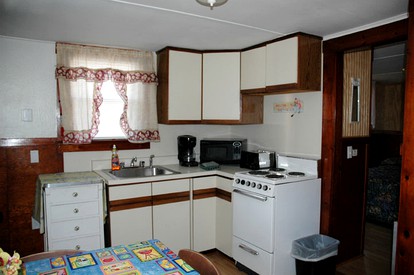 Lovely Lakefront Cottage Rental with Private Beach in New Hampshire - Weirs Beach, New Hampshire - glamping.directory