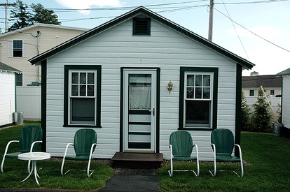 Lovely Lakefront Cottage Rental with Private Beach in New Hampshire - Weirs Beach, New Hampshire - glamping.directory