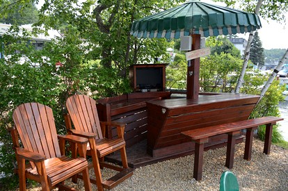 Lovely Lakefront Cottage Rental with Private Beach in New Hampshire - Weirs Beach, New Hampshire - glamping.directory