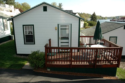 Lovely Lakefront Cottage Rental with Private Beach in New Hampshire - Weirs Beach, New Hampshire - glamping.directory