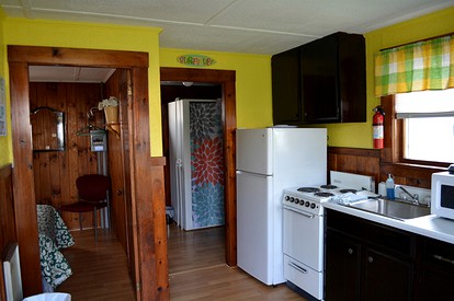 Lovely Lakefront Cottage Rental with Private Beach in New Hampshire - Weirs Beach, New Hampshire - glamping.directory