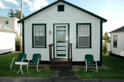 Lovely Lakefront Cottage Rental with Private Beach in New Hampshire - Weirs Beach, New Hampshire - glamping.directory
