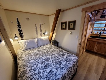 Secluded A-Frame Cabin with Private Riverfront on Little Manistee River near Tustin, Michigan - Tustin, Michigan - glamping.directory