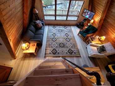 Secluded A-Frame Cabin with Private Riverfront on Little Manistee River near Tustin, Michigan - Tustin, Michigan - glamping.directory