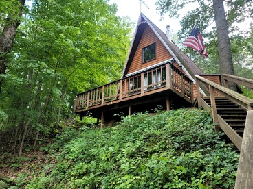 Secluded A-Frame Cabin with Private Riverfront on Little Manistee River near Tustin, Michigan - glamping.directory