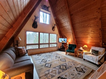 Secluded A-Frame Cabin with Private Riverfront on Little Manistee River near Tustin, Michigan - Tustin, Michigan - glamping.directory