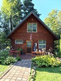 Charming Creekside Log Cabin with Wood Burning Stove Overlooking the Neshannock Creek, Western PA - Volant, Pennsylvania - glamping.directory