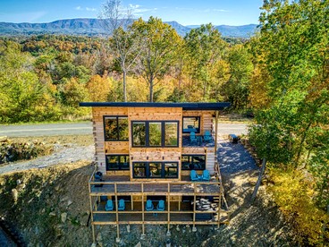 Stunning Lakefront Cabin with Hot Tub and Pool Table on Douglas Lake in Dandridge, Tennessee - glamping.directory