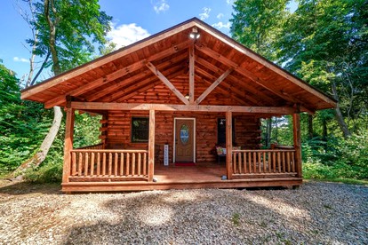 Romantic Getaways in Logan, Ohio, in this Fully-Equipped Log Cabin with Hot Tub - glamping.directory