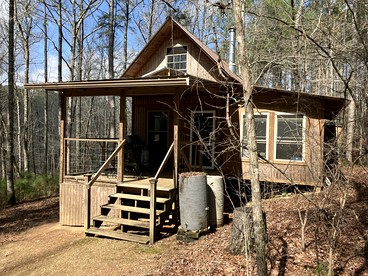 Secluded Woodland Cabin for an Authentic Off-Grid Nature Escape in Fruithurst, Alabama - glamping.directory