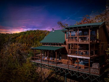 Stunning Smoky Mountain Log Cabin with 270° Views, Luxury Amenities & Hot Tub near Gatlinburg, TN - glamping.directory