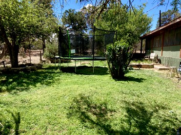 Charming Rural Home with Mountain Views & Starlink Internet near Highway Access in Remote New Mexico - Fence Lake, New Mexico - glamping.directory