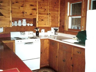 Seven-Person Cabin Rental with Stone Fireplace Overlooking Lake Paradox in Adirondacks - Severance, New York - glamping.directory