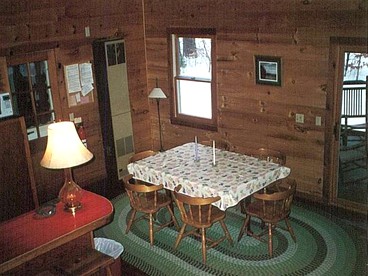 Seven-Person Cabin Rental with Stone Fireplace Overlooking Lake Paradox in Adirondacks - Severance, New York - glamping.directory