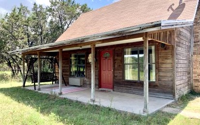 Western-Themed Cabin with Hot Tub, Fireplace & Pool Access near Meadow Retreat in Texas - glamping.directory