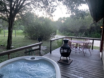 Western-Themed Cabin with Hot Tub, Fireplace & Pool Access near Meadow Retreat in Texas - Bluff Dale, Texas - glamping.directory