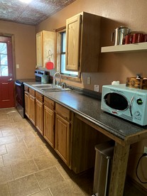 Western-Themed Cabin with Hot Tub, Fireplace & Pool Access near Meadow Retreat in Texas - Bluff Dale, Texas - glamping.directory