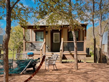 Tranquil Family Vacation by a Creek: Luxury Tented Cabin in Seguin, Texas - glamping.directory
