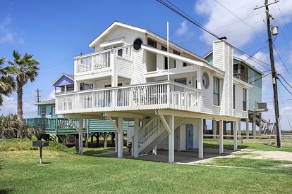 Charming Beach House with Breathtaking Ocean View and Spacious Decks in Jamaica Beach, Texas - Jamaica Beach, Texas - glamping.directory