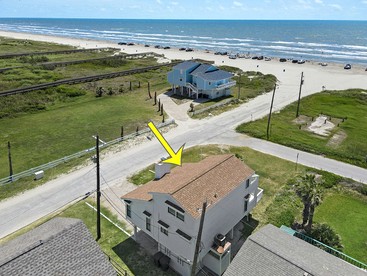Charming Beach House with Breathtaking Ocean View and Spacious Decks in Jamaica Beach, Texas - glamping.directory
