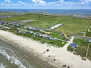 Charming Beach House with Breathtaking Ocean View and Spacious Decks in Jamaica Beach, Texas - Jamaica Beach, Texas - glamping.directory