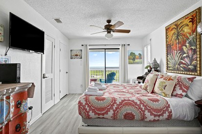 Charming Beach House with Breathtaking Ocean View and Spacious Decks in Jamaica Beach, Texas - Jamaica Beach, Texas - glamping.directory