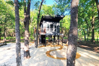 Beautiful Modern Tree House Cabin Surrounded by Trees for a Peaceful Romantic Getaway near Lone Oak, Texas - glamping.directory