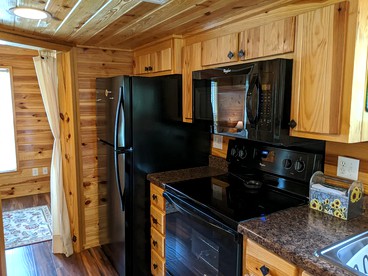 Rustic Cabin Rental near Asheville Perfect for a Weekend Getaway on Tuckasegee River - Tuckasegee, North Carolina - glamping.directory