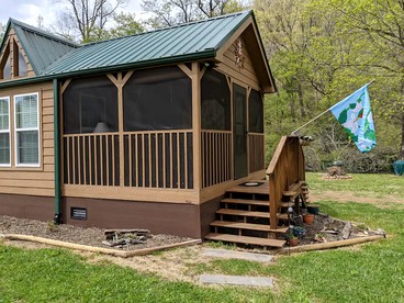 Rustic Cabin Rental near Asheville Perfect for a Weekend Getaway on Tuckasegee River - glamping.directory