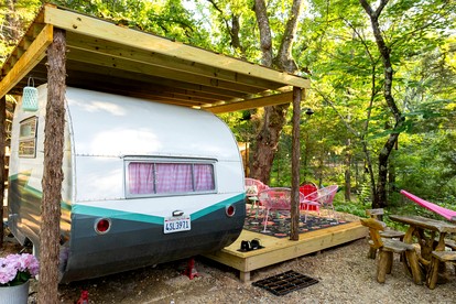 Luxurious Remodeled Airstream with Wraparound Deck and Spa near Honey Grove, Texas - Honey Grove, Texas - glamping.directory