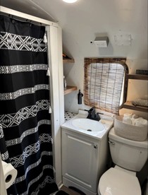 Luxurious Remodeled Airstream with Wraparound Deck and Spa near Honey Grove, Texas - Honey Grove, Texas - glamping.directory