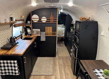 Luxurious Remodeled Airstream with Wraparound Deck and Spa near Honey Grove, Texas - glamping.directory