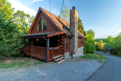 Picturesque Log Cabin with Private Hot Tub and Arcade Games on Douglas Lake near Sevierville, Tennessee - glamping.directory
