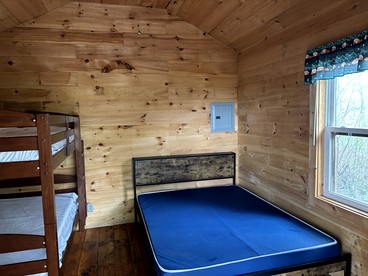 Cozy Rustic Cabin with Fire Ring & Outdoor Seating in Macedon, New York - Macedon, New York - glamping.directory