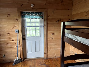 Cozy Rustic Cabin with Fire Ring & Outdoor Seating in Macedon, New York - Macedon, New York - glamping.directory