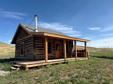 Charming Cabin with Pond and Mountain Views near Downtown Ennis, Montana - glamping.directory