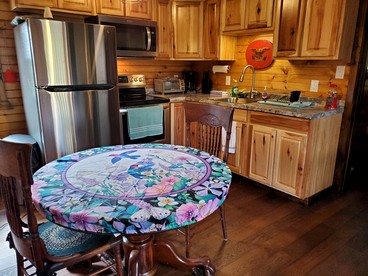 Wooden Rustic Cabin Great for Outdoor Activities in Liberty, Kentucky - Liberty, Kentucky - glamping.directory