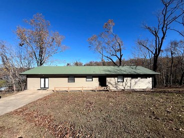 Peaceful Lakeside Cabin with Private Dock near Bentonville & Fayetteville, Arkansas - glamping.directory