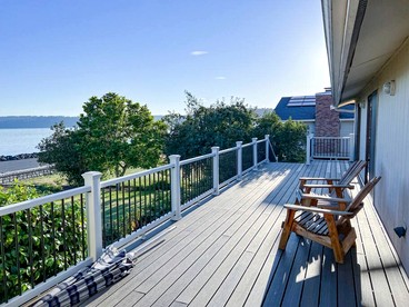 Waterfront Cottage with Large Deck, Foosball Table and Ping Pong Table in Washington - glamping.directory