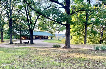 Secluded Riverfront Cabin with Bluff Views, Gated Privacy & Scenic Trail Access in Tahlequah, Oklahoma - glamping.directory