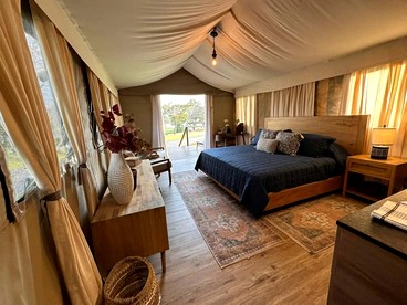 Romantic Lakefront Cabin with Fire Pit near Lake Bastrop, Texas – Luxury Glamping Escape for Couples - Bastrop , Texas - glamping.directory