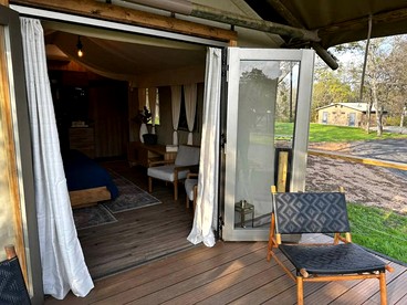Romantic Lakefront Cabin with Fire Pit near Lake Bastrop, Texas – Luxury Glamping Escape for Couples - Bastrop , Texas - glamping.directory